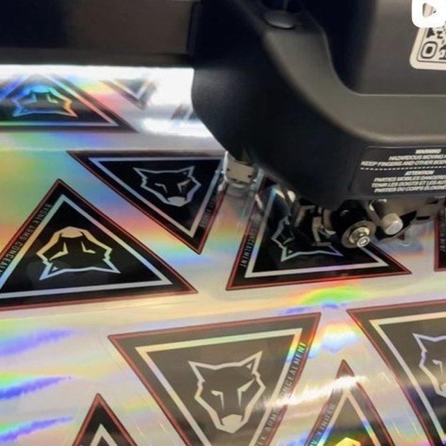 Holographic die-cut stickers on the cutter