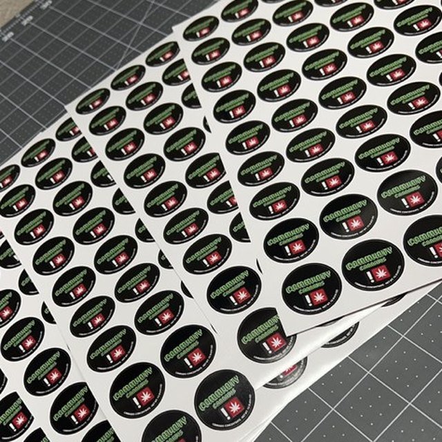 Die-cut oval sticker sheet